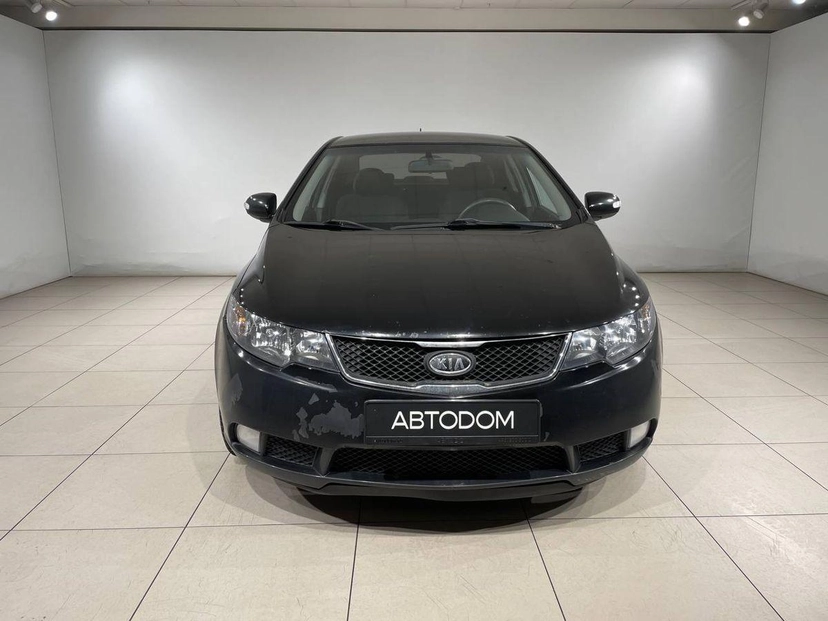 Автомобиль Kia Cerato II поколение 4-speed 1.6 AT (126 л.с.) Base Чёрный 2009 с пробегом 150 018 км