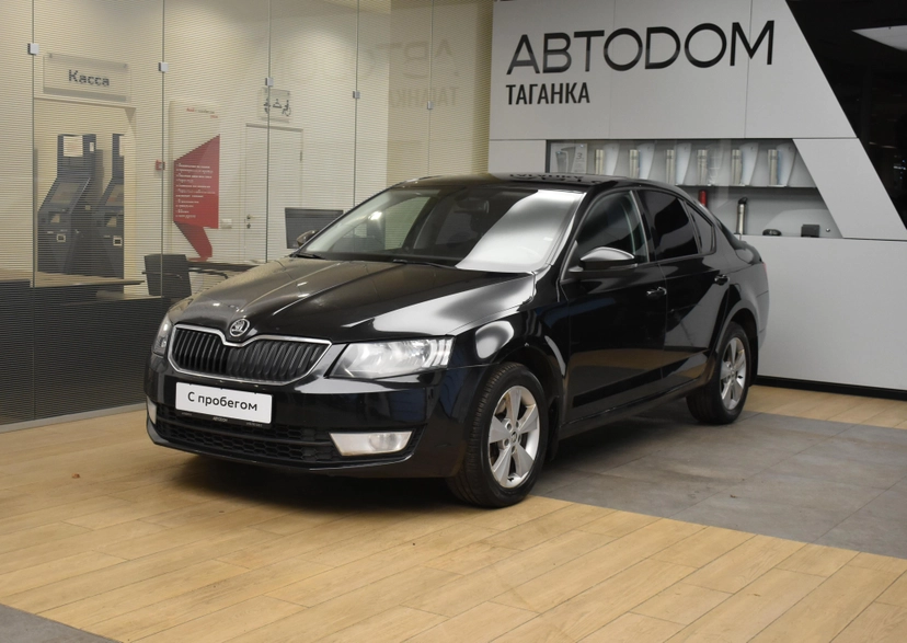 Автомобиль Skoda Octavia III поколение (A7) 1.8 MT (180 л.с.) Ambition Чёрный 2014 с пробегом 168 000 км