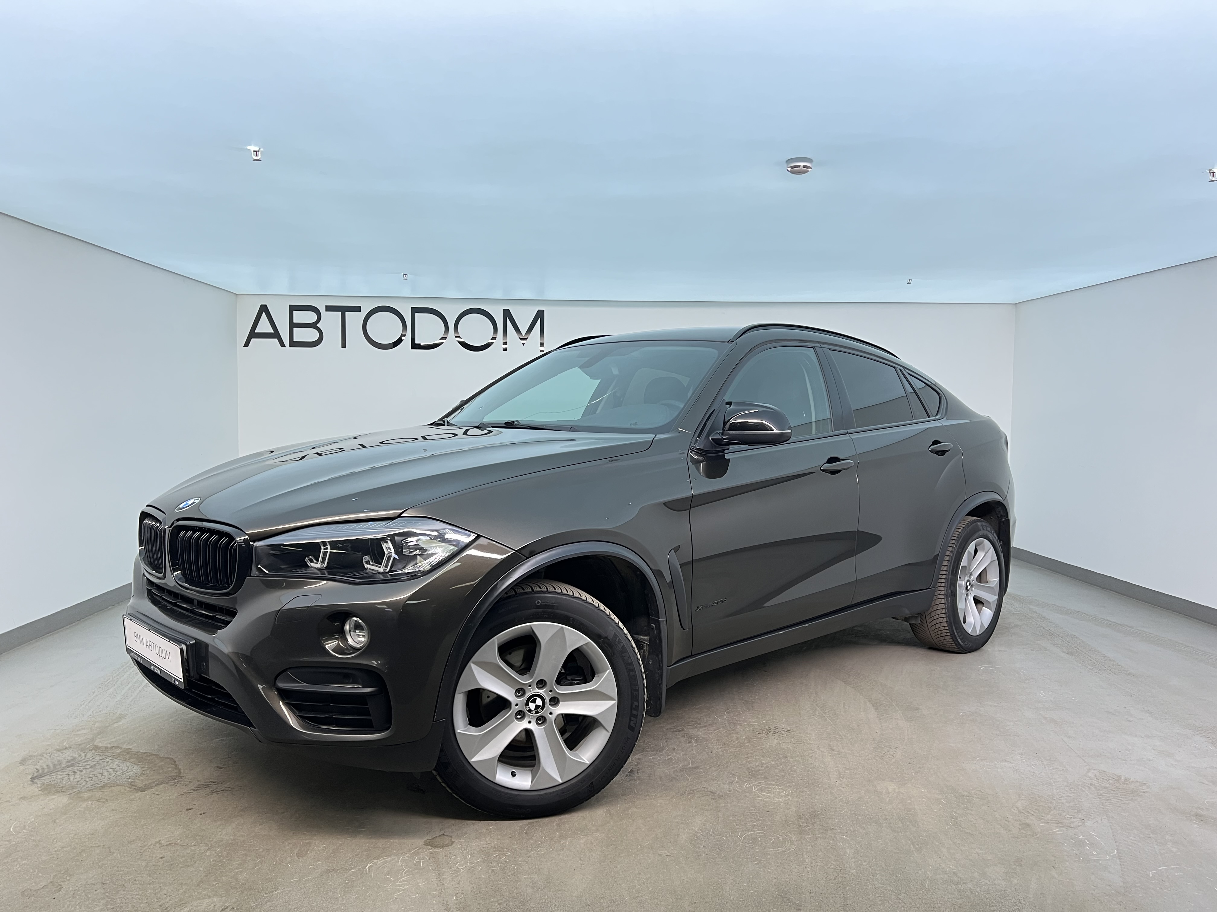 Автомобиль BMW X6 II поколение (F16) 3.0d AT 4WD (249 л.с.) Business Коричневый 2016 с пробегом 150 379 км
