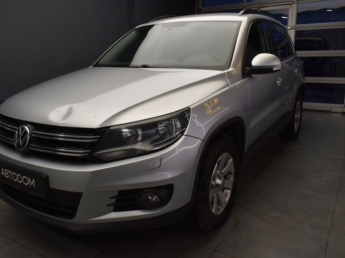 Volkswagen Tiguan I [рестайлинг] 1.4 AMT (150 л.с.) Avenue Серебристый 2013 с пробегом 232 000 км