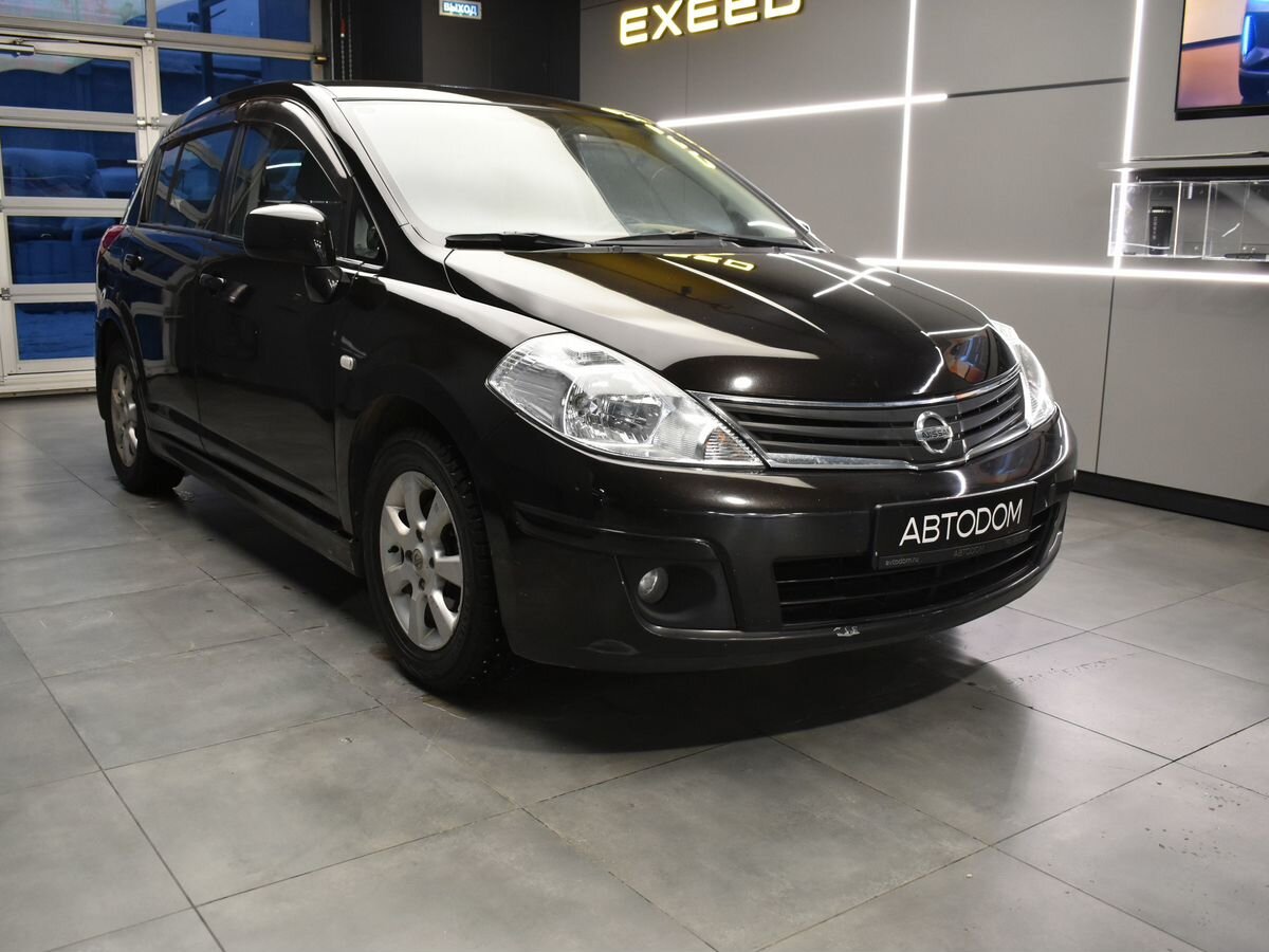 Автомобиль Nissan Tiida I (C11) [рестайлинг] 1.6 AT (110 л.с.) Tekna Чёрный 2010 с пробегом 99 000 км