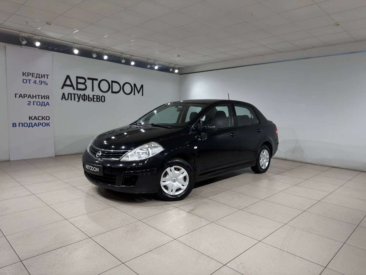 Nissan Tiida I (C11) [рестайлинг] 1.6 MT (110 л.с.) Comfort Чёрный 2012 с пробегом 194 658 км