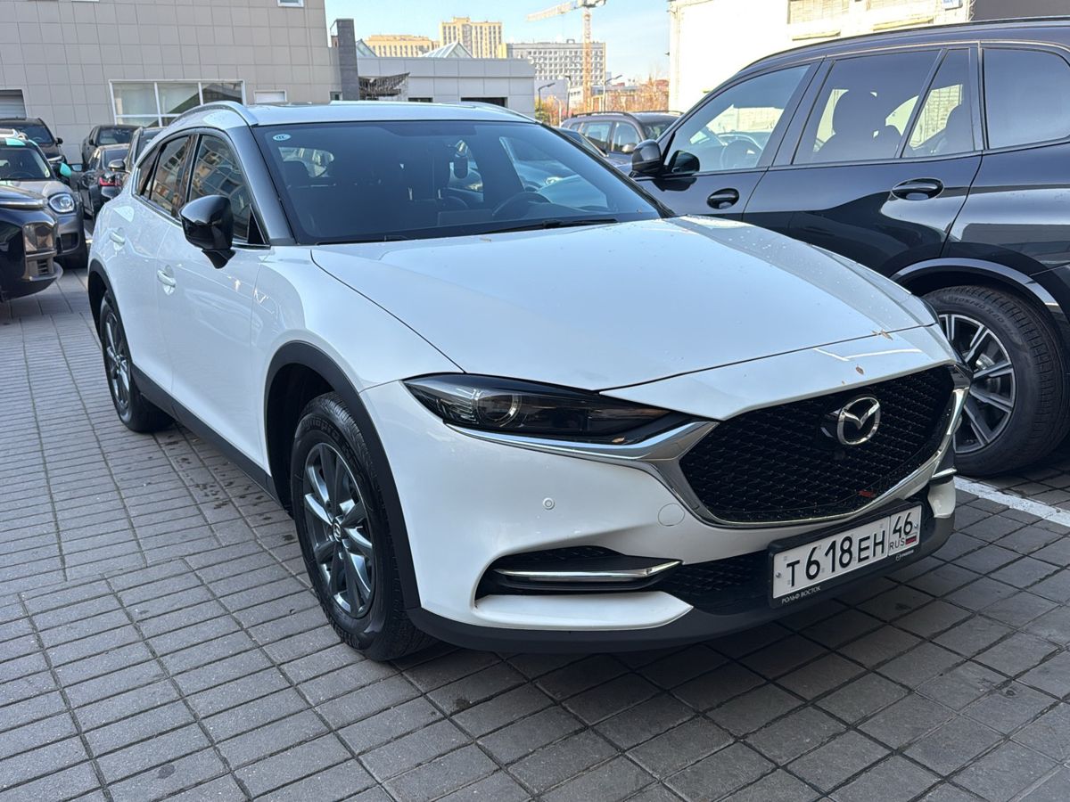Mazda CX-4 I [рестайлинг] 2.0 AT (158 л.с.) High Белый 2023 с пробегом 30 870 км