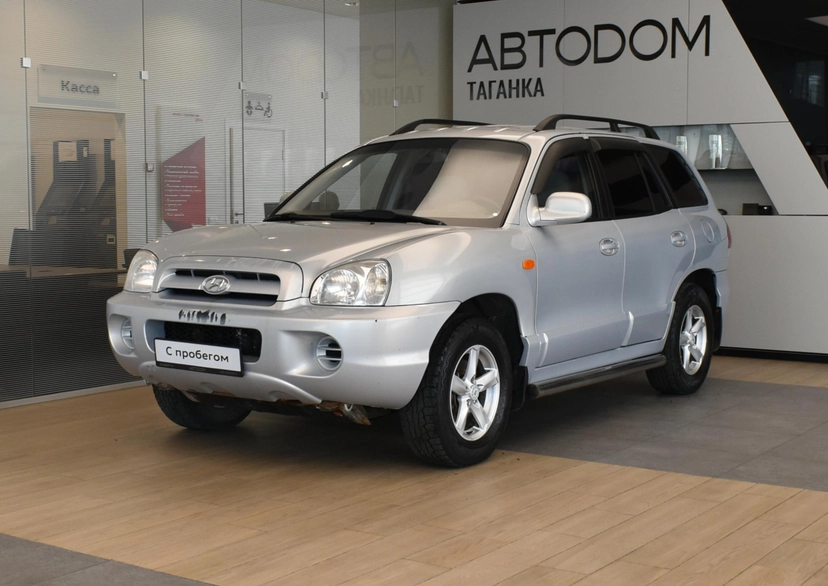 Автомобиль Hyundai Santa Fe I поколение (Classic) 2.7 AT 4WD (173 л.с.) Base Серебристый 2009 с пробегом 203 242 км