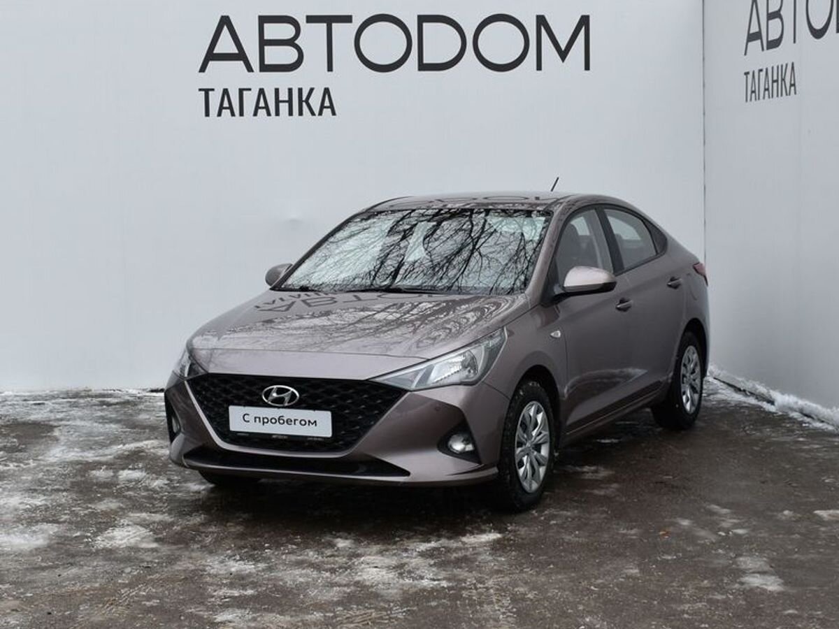Автомобиль Hyundai Solaris II [рестайлинг] 1.6 AT (123 л.с.) Comfort Коричневый 2020 с пробегом 58 900 км