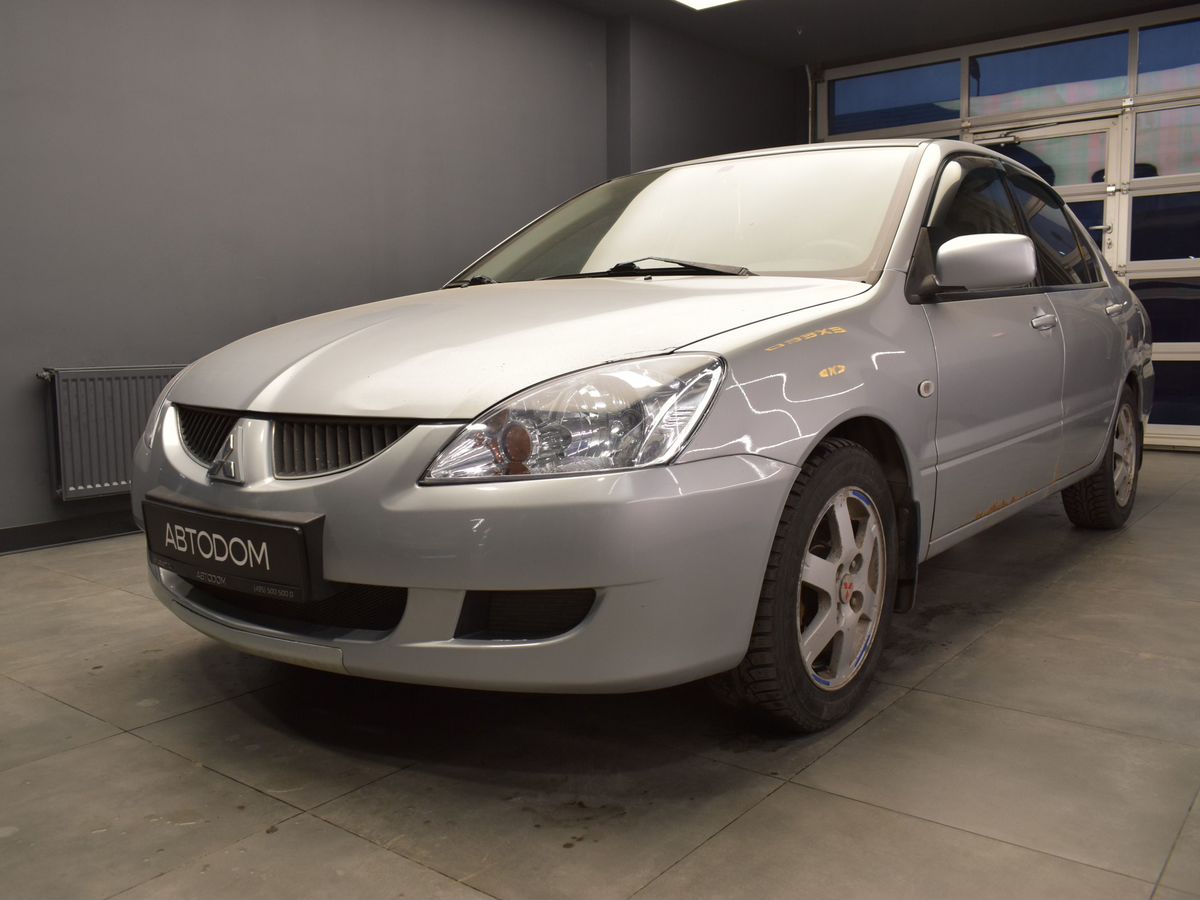 Автомобиль Mitsubishi Lancer IX поколение 1.6 AT (98 л.с.) Base Серый 2004 с пробегом 155 188 км