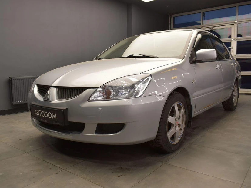 Автомобиль Mitsubishi Lancer IX поколение 1.6 AT (98 л.с.) Base Серый 2004 с пробегом 155 188 км