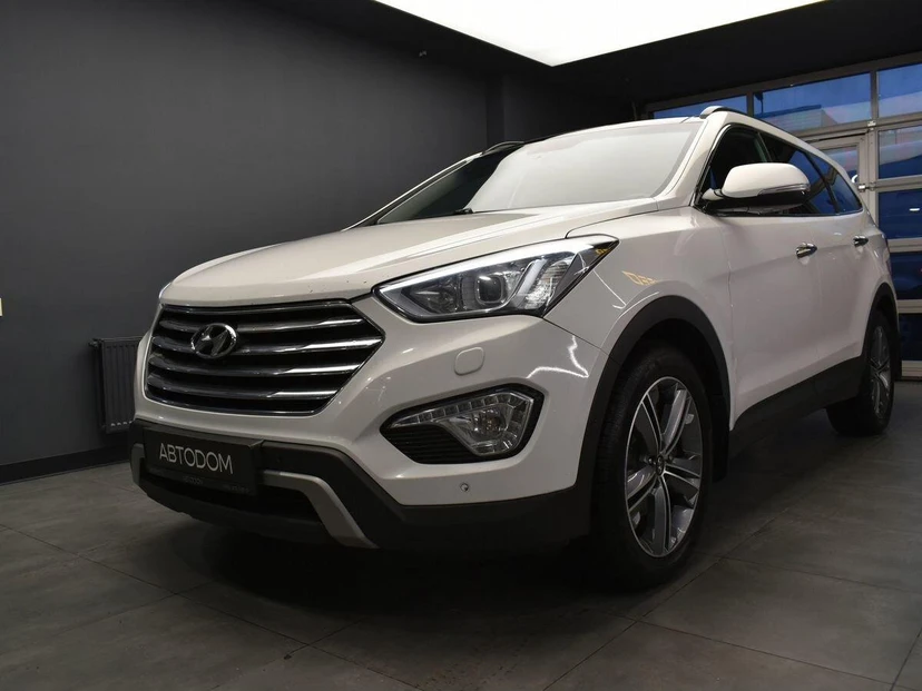 Hyundai Santa Fe III поколение (DM) 2.2d AT 4WD (197 л.с.) High-Tech Белый 2015 с пробегом 246 997 км