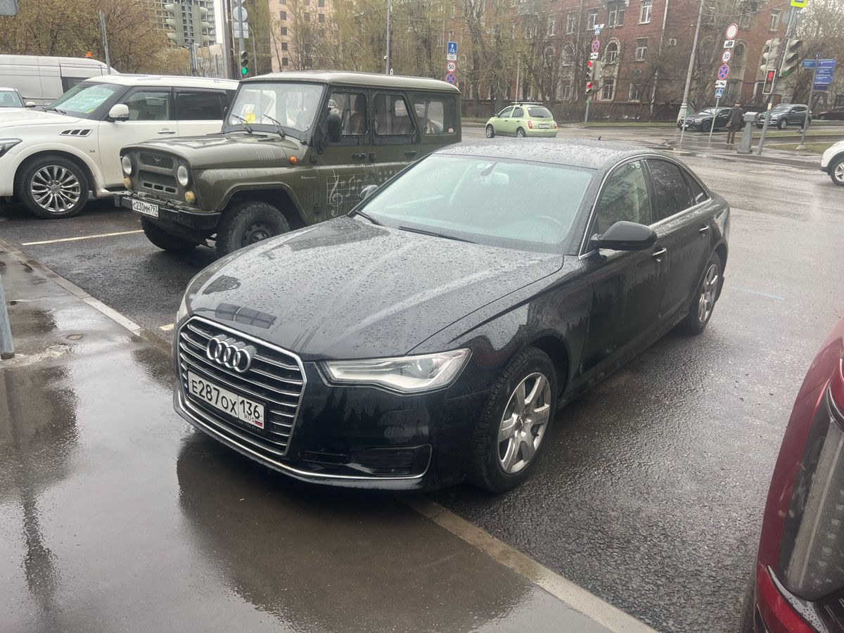 Автомобиль Audi A6 IV (C7) [рестайлинг] 2.8 AMT 4WD (220 л.с.) Base Чёрный 2015 с пробегом 262 370 км