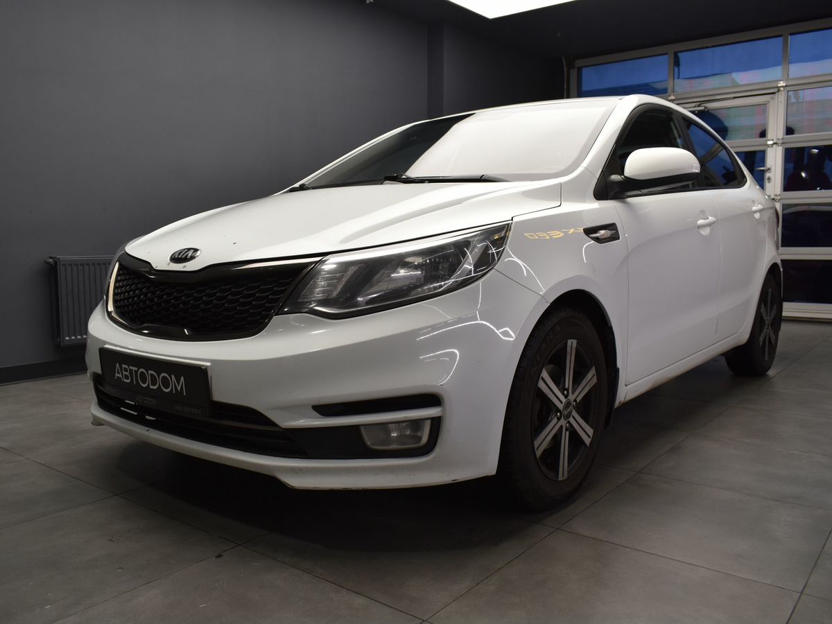 Kia Rio III [рестайлинг] 1.6 MT (123 л.с.) Luxe Белый 2016 с пробегом 153 911 км