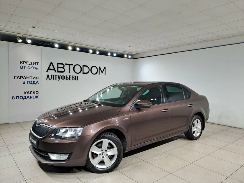 Автомобиль Skoda Octavia III поколение (A7) 1.4 AMT (140 л.с.) Elegance Коричневый 2015 с пробегом 241 000 км