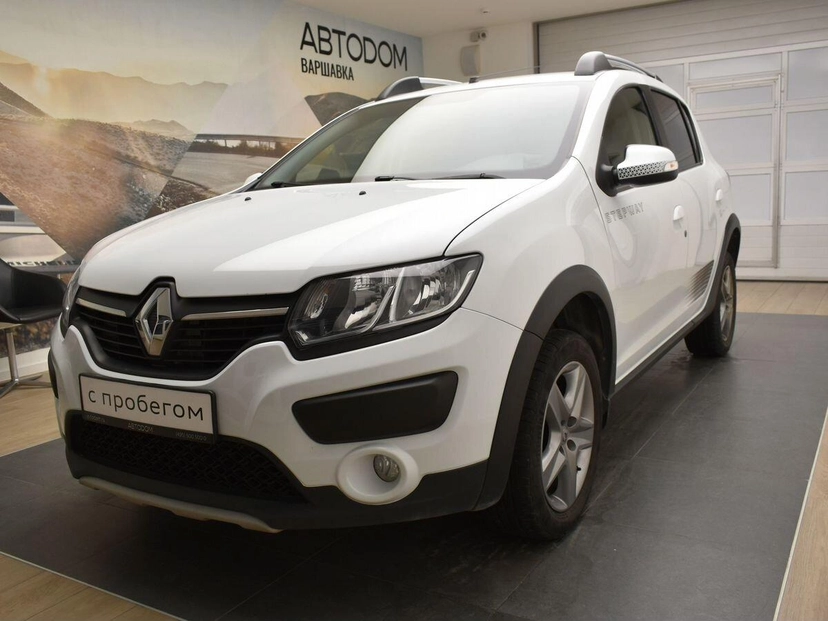 Автомобиль Renault Sandero II поколение 1.6 AT (102 л.с.) Privilege Белый 2018 с пробегом 57 687 км