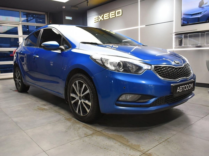 Автомобиль Kia Cerato III поколение 1.6 AT (130 л.с.) Premium Синий 2014 с пробегом 167 485 км