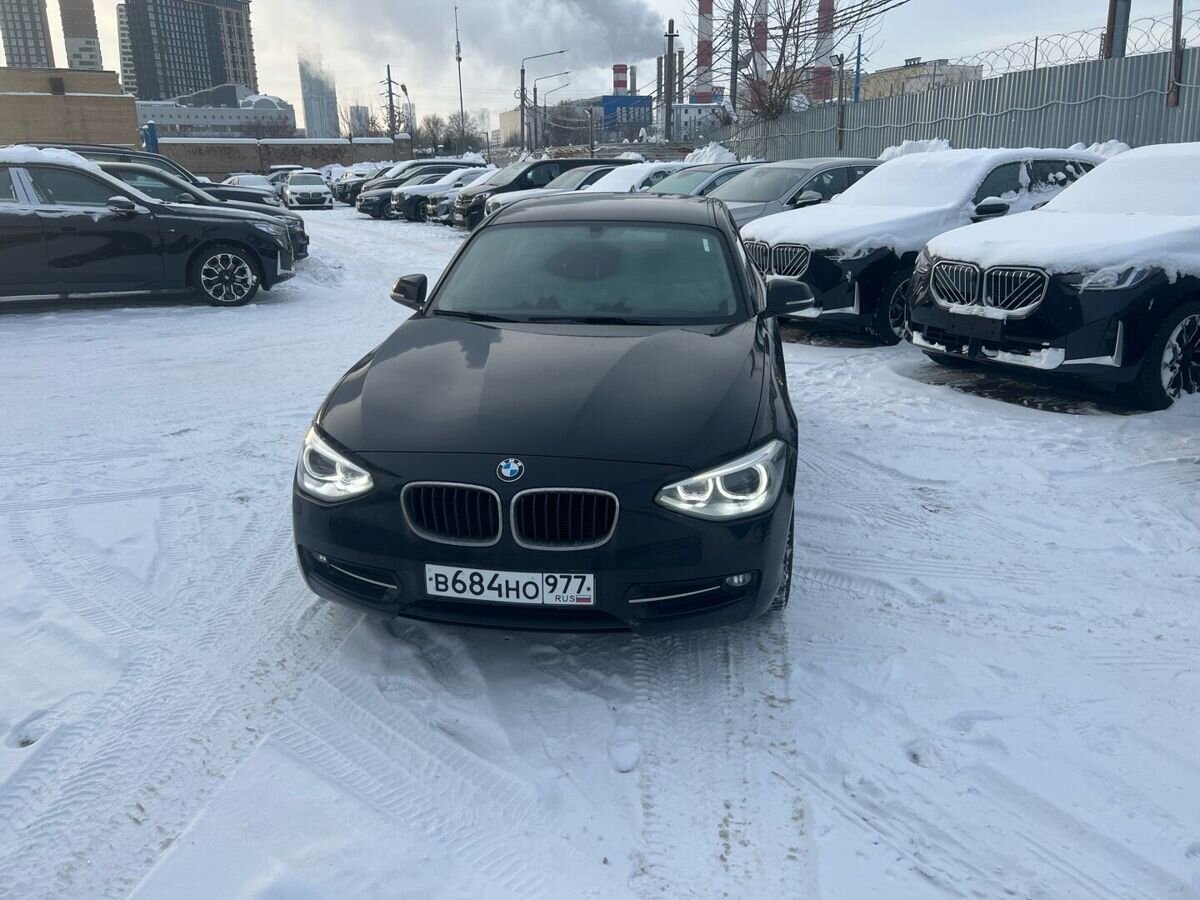 Автомобиль BMW 1 серии II поколение (F20/F21) 116 1.6 AT (136 л.с.) Base Чёрный 2014 с пробегом 45 000 км