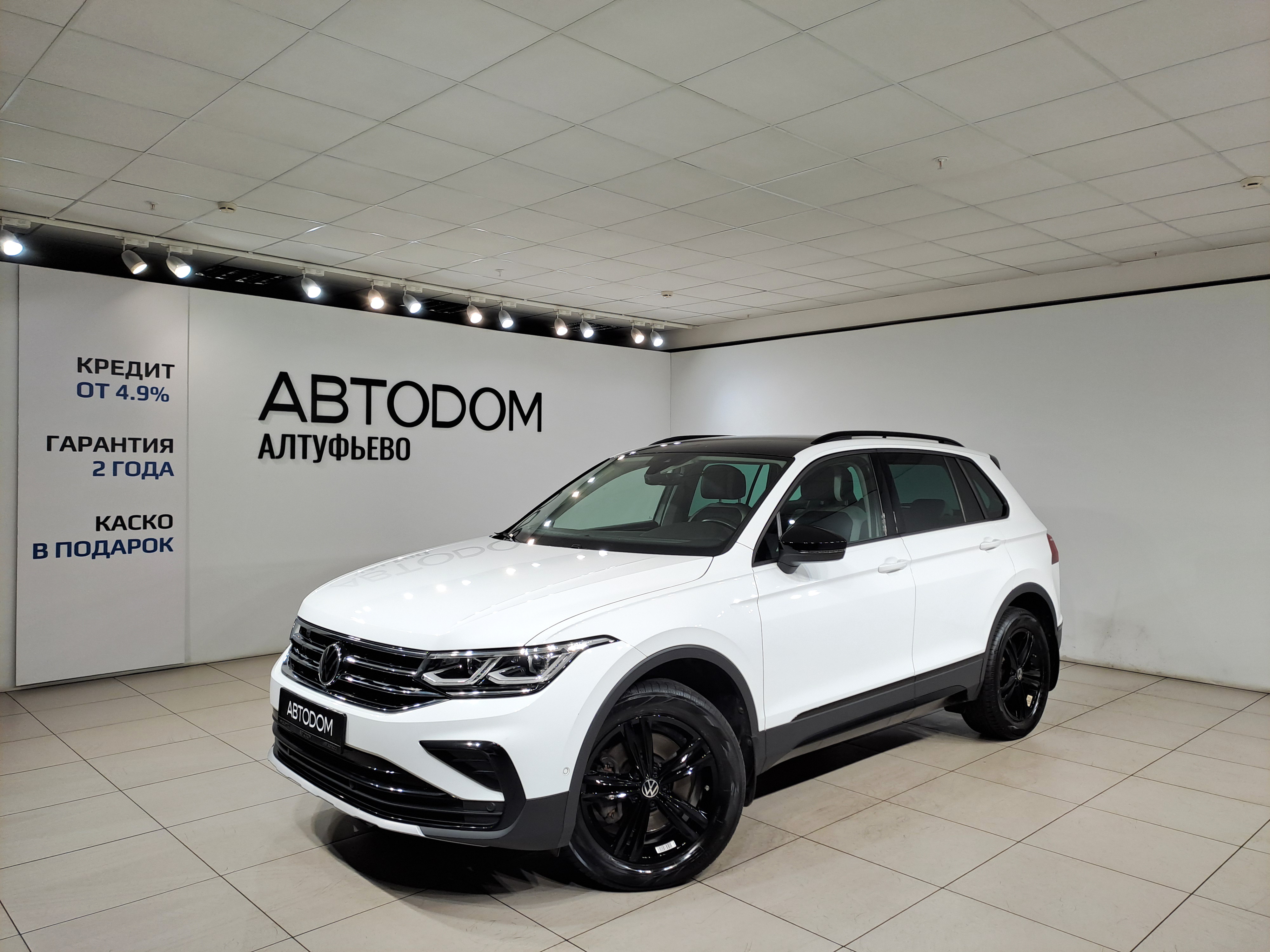 Автомобиль Volkswagen Tiguan II [рестайлинг] 2.0 AMT 4WD (180 л.с.) Exclusive Белый 2021 с пробегом 49 000 км