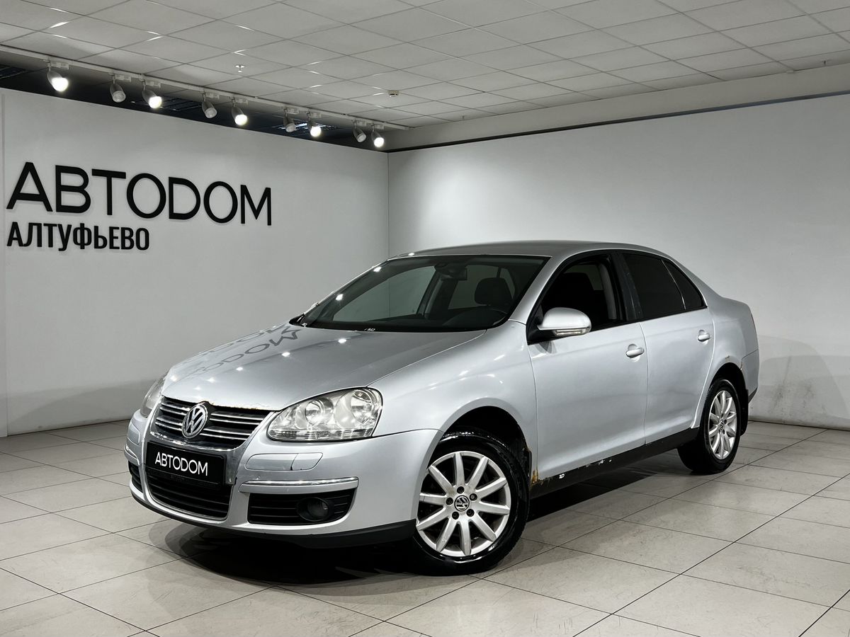 Volkswagen Jetta V поколение 1.6 AT (102 л.с.) Base Серебристый 2008 с пробегом 276 700 км