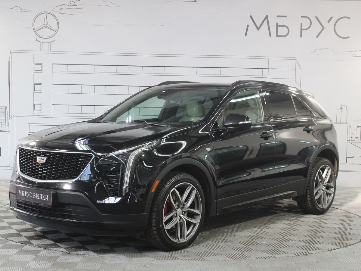 Автомобиль Cadillac XT4 I поколение 2.0 AT 4WD (200 л.с.) Sport Чёрный 2021 с пробегом 37 801 км