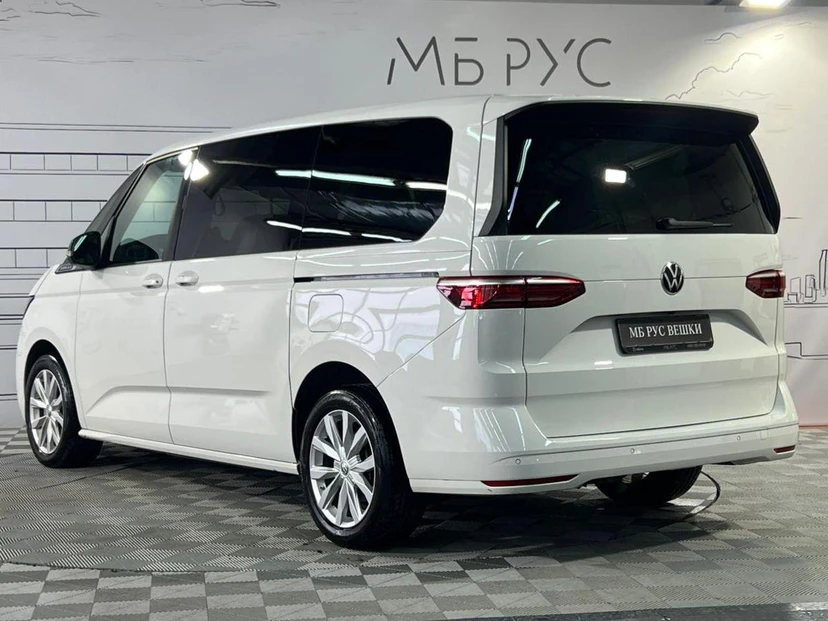 Автомобиль Volkswagen Multivan V поколение (T7) 2.0 AMT (204 л.с.) Life Белый 2022 с пробегом 83 889 км