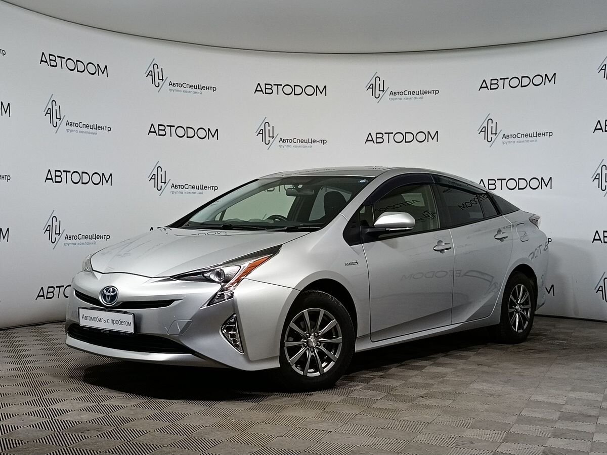 Автомобиль Toyota Prius IV поколение (XW50) 1.8hyb CVT (98 л.с.) Люкс Серый 2016 с пробегом 131 419 км