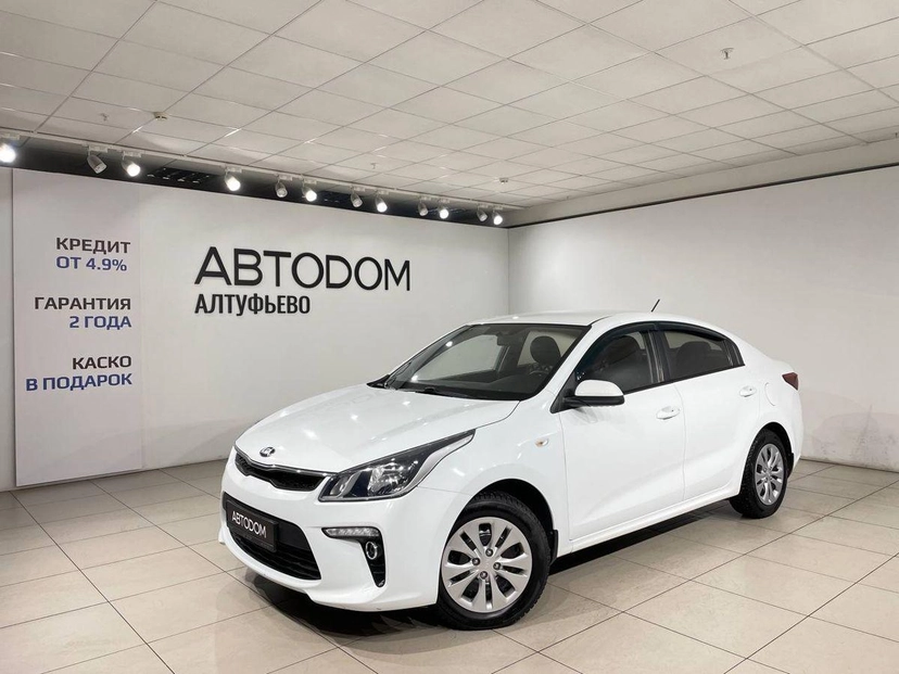 Автомобиль Kia Rio IV поколение 1.6 MT (123 л.с.) Лига Европы Белый 2019 с пробегом 132 000 км