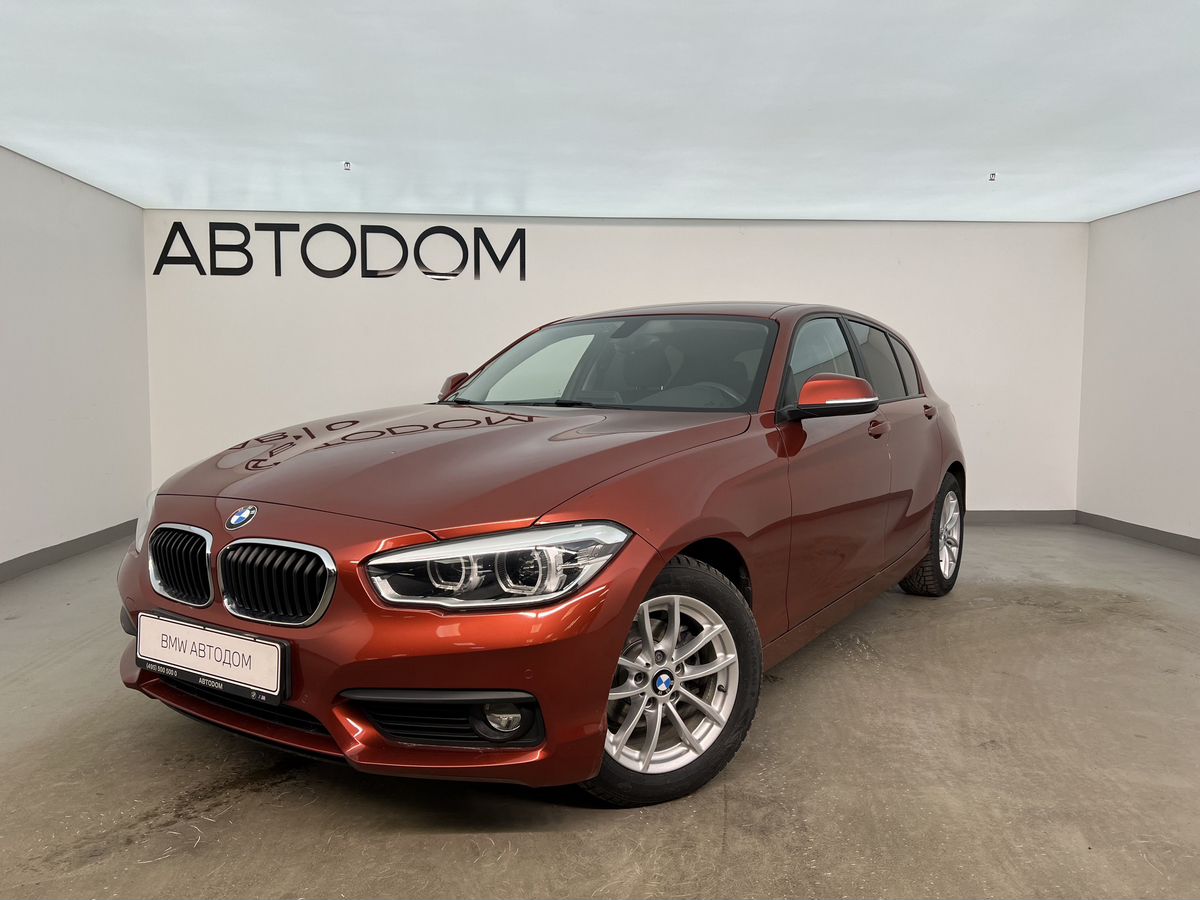 Автомобиль BMW 1 серии II (F20/F21) [2-й рестайлинг] 118 1.5 AT (136 л.с.) Special Edition Оранжевый 2018 с пробегом 60 263 км