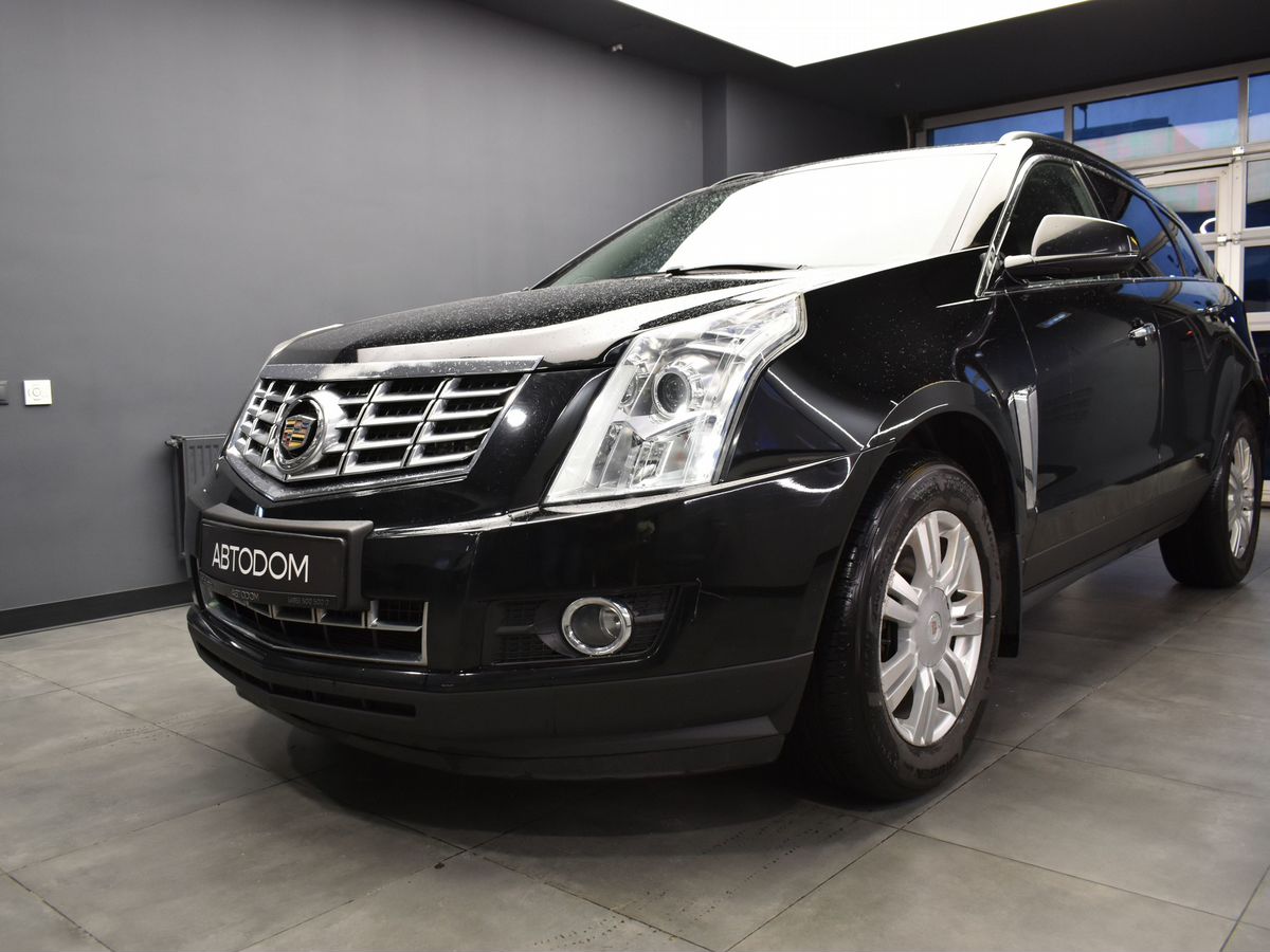 Cadillac SRX II [рестайлинг] 3.0 AT 4WD (249 л.с.) Base Чёрный 2015 с пробегом 132 000 км