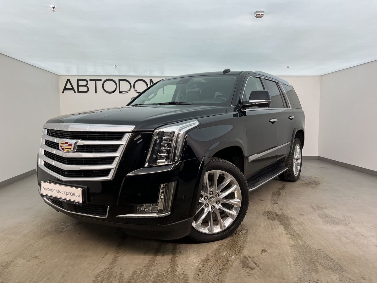 Автомобиль Cadillac Escalade IV поколение 6.2 AT 4WD (426 л.с.) Platinum Чёрный 2020 с пробегом 107 982 км