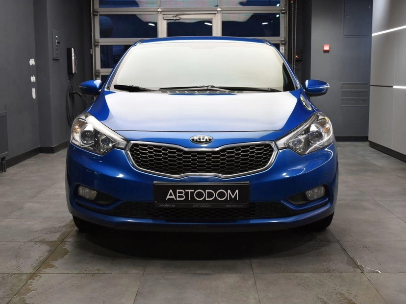 Автомобиль Kia Cerato III поколение 1.6 AT (130 л.с.) Premium Синий 2014 с пробегом 167 485 км