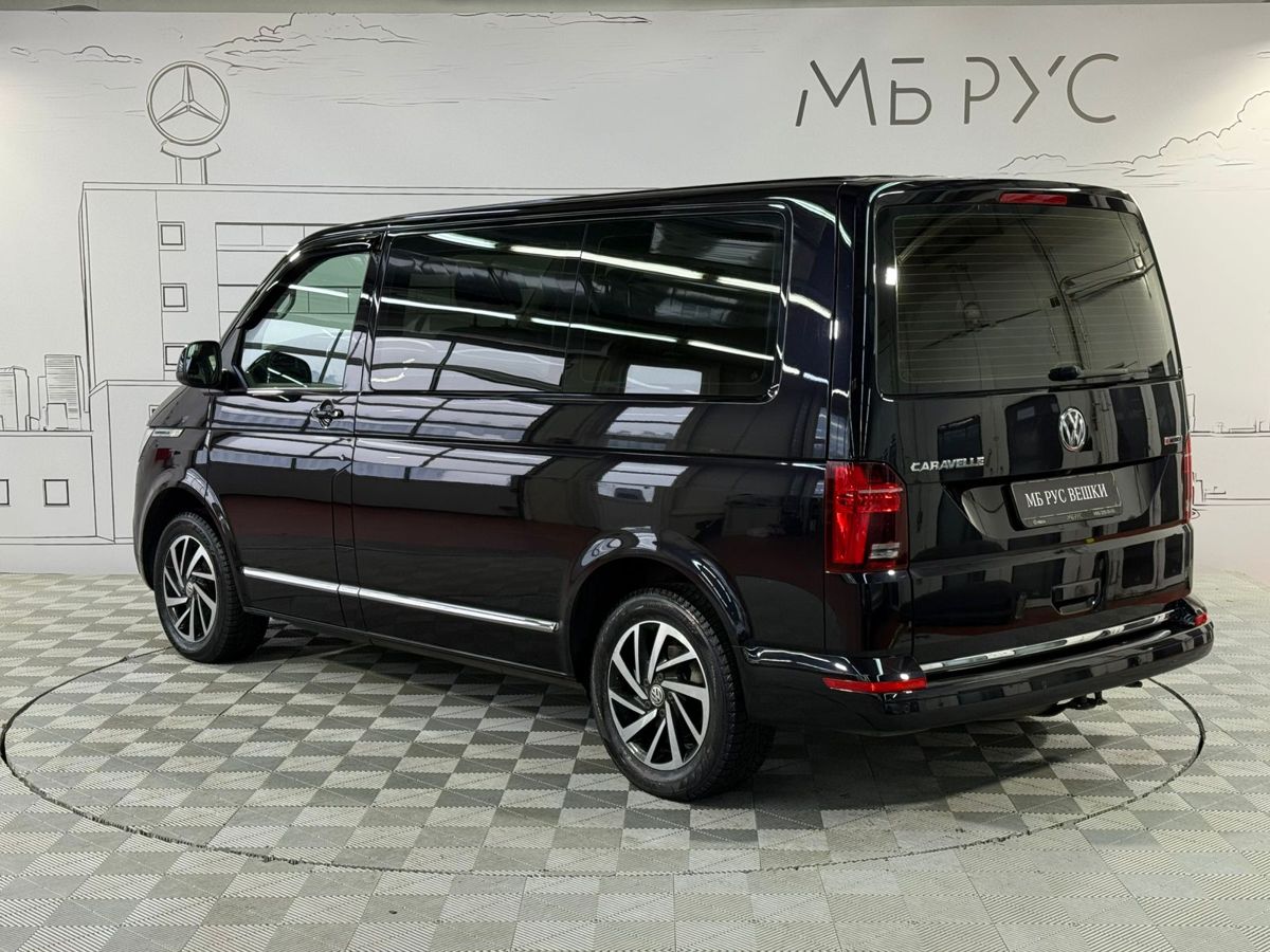 Автомобиль Volkswagen Caravelle IV (T6) [рестайлинг] 2.0d AMT 4WD (150 л.с.) Trendline Чёрный 2021 с пробегом 169 000 км