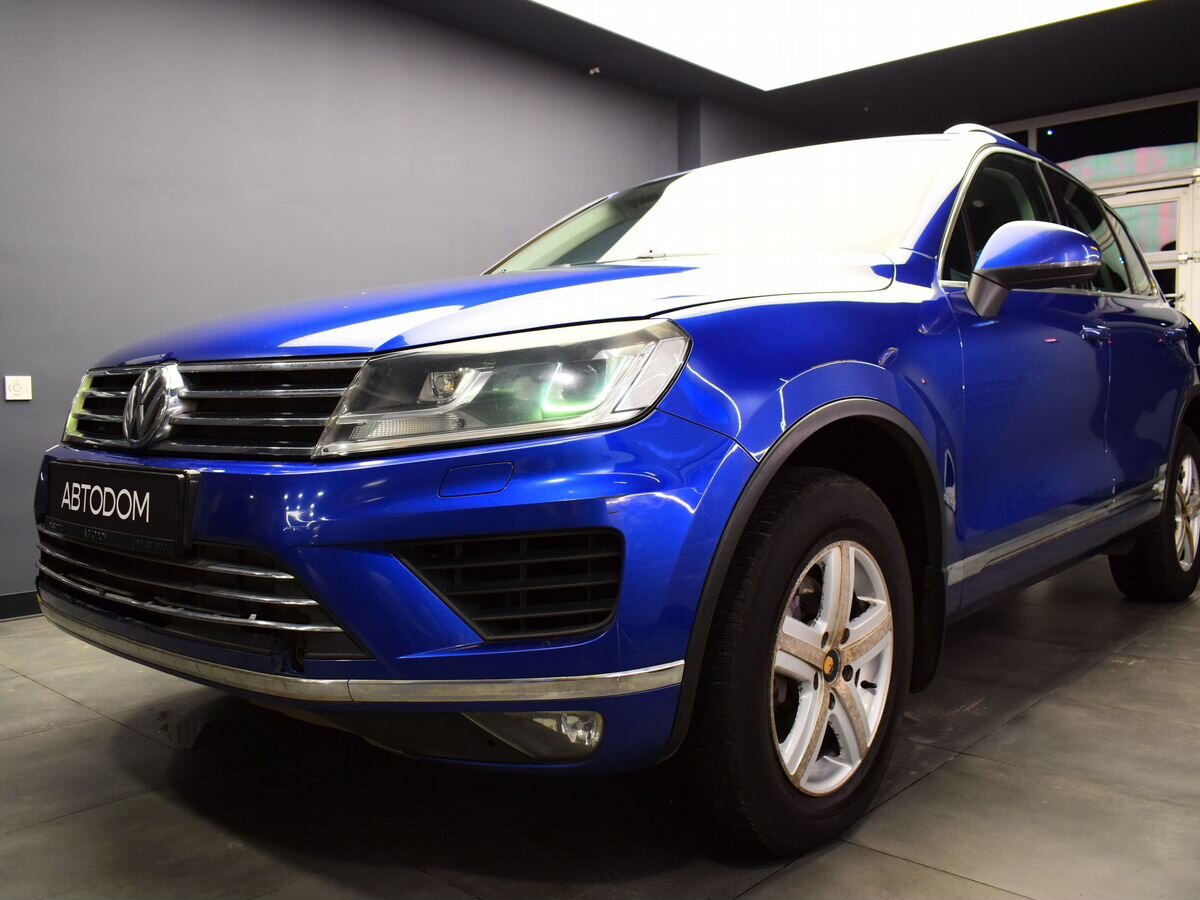 Автомобиль Volkswagen Touareg II [рестайлинг] 3.6 AT 4WD (249 л.с.) Business Синий 2014 с пробегом 237 700 км