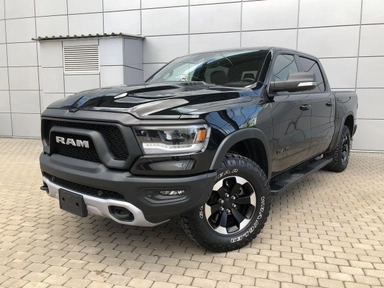 Автомобиль RAM 1500 V поколение 5.7 AT 4WD (395 л.с.) Rebel Черный 2022 с пробегом 21131 км