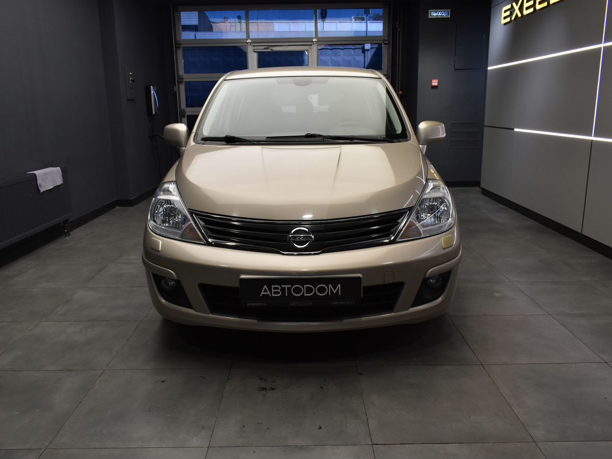 Nissan Tiida I (C11) [рестайлинг] 1.6 AT (110 л.с.) Base Серебристый 2011 с пробегом 27 025 км