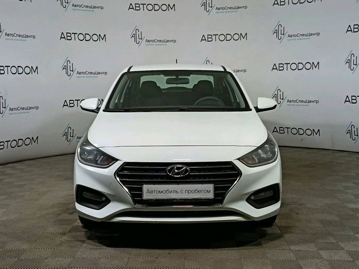 Автомобиль Hyundai Solaris II поколение 1.4 AT (100 л.с.) Comfort Белый 2017 с пробегом 140 068 км