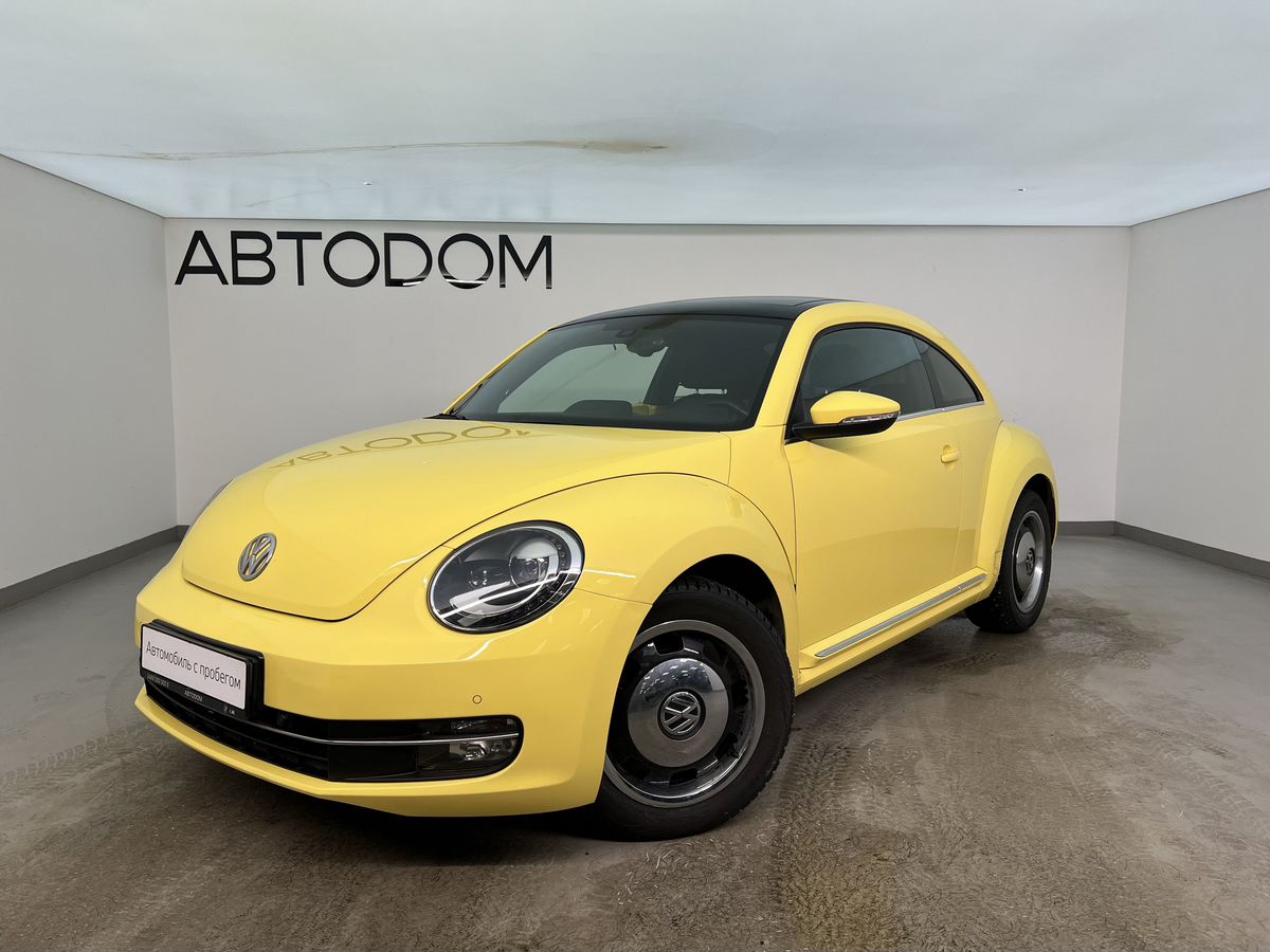 Автомобиль Volkswagen Beetle II поколение (A5) 1.2 AMT (105 л.с.) Beetle Жёлтый 2014 с пробегом 54 224 км