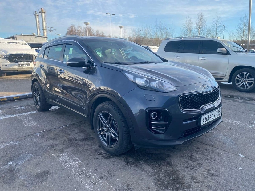 Автомобиль Kia Sportage IV поколение 2.0 AT 4WD (150 л.с.) Premium Серый 2016 с пробегом 111 840 км