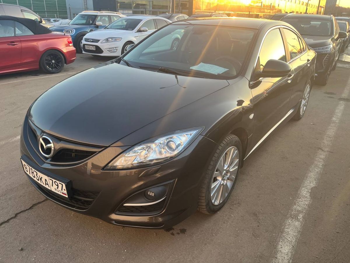 Автомобиль Mazda 6 II (GH) [рестайлинг] 2.0 AT (147 л.с.) Impulse Line Коричневый 2012 с пробегом 238 655 км