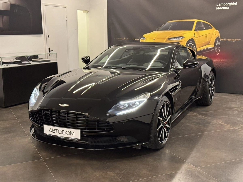Автомобиль Aston Martin DB11 I поколение 5.2 V12 AT (608 л.с.) Individual Чёрный 2017 с пробегом 5 188 км