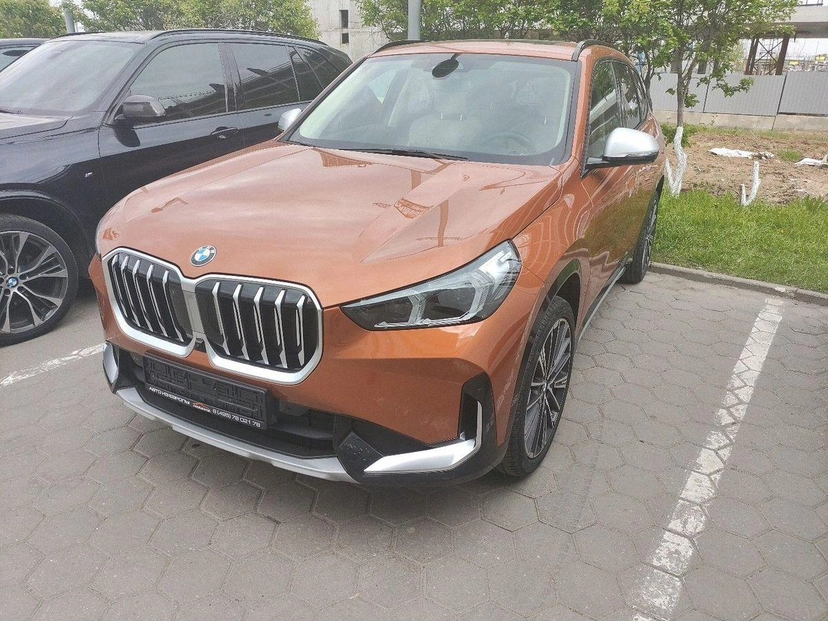 Автомобиль BMW X1 III поколение (U11) 2.0d AMT 4WD (197 л.с.) Base Оранжевый 2022 с пробегом 18 850 км