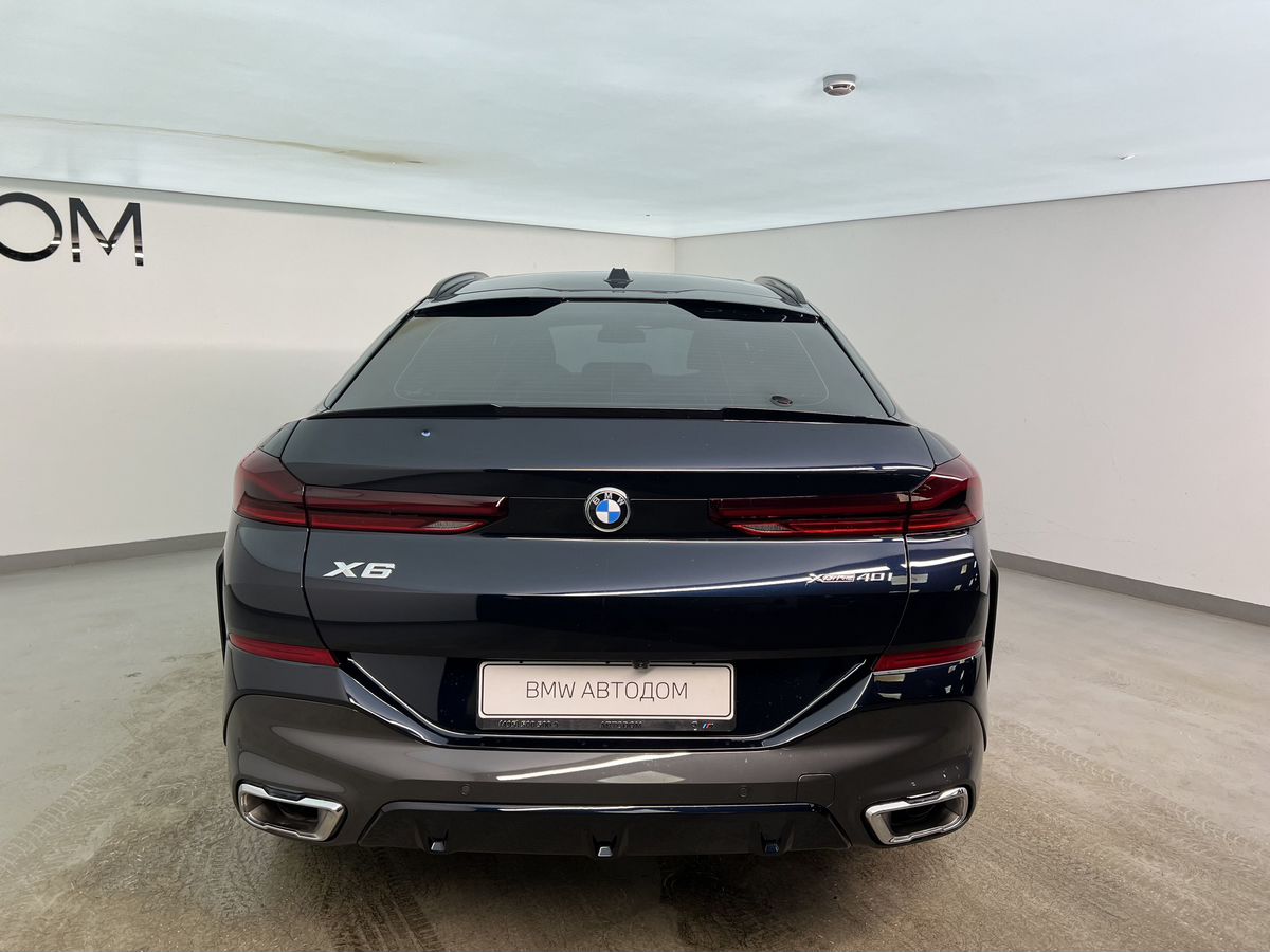 Автомобиль BMW X6 III (G06) [рестайлинг] 3.0 AT 4WD (381 л.с.) Base Чёрный 2024 с пробегом 7 703 км