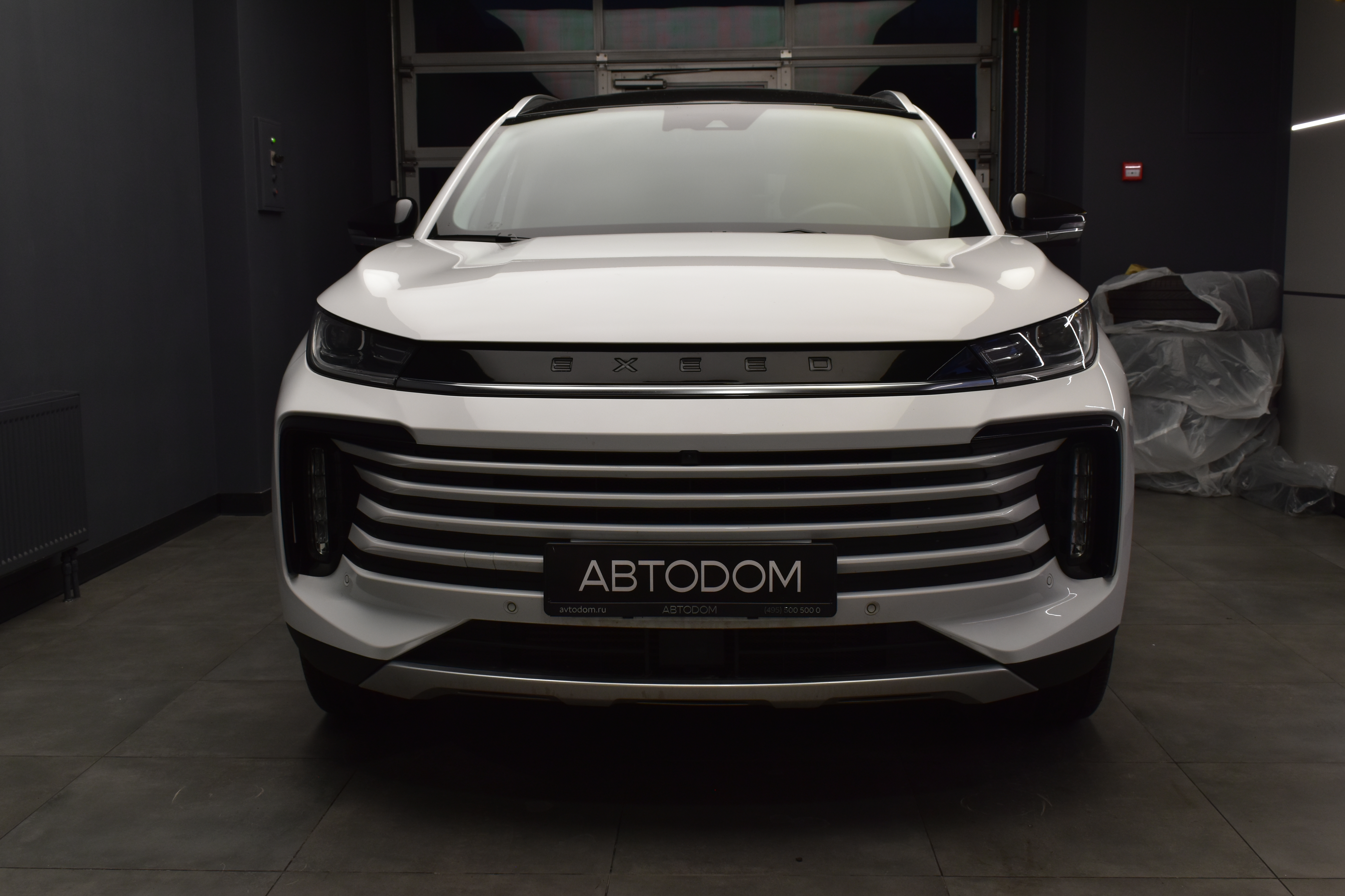 Автомобиль EXEED TXL I [рестайлинг] 2.0 AMT 4WD (197 л.с.) Sport Edition Белый 2022 с пробегом 30 180 км