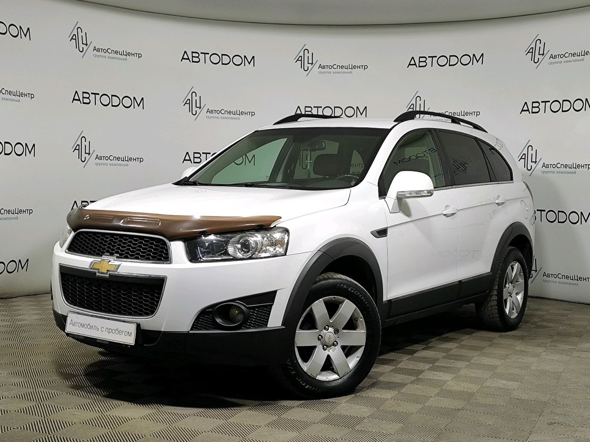 Автомобиль Chevrolet Captiva I [рестайлинг] 2.2d AT 4WD (5 мест) (184 л.с.) LT Белый 2013 с пробегом 182 596 км