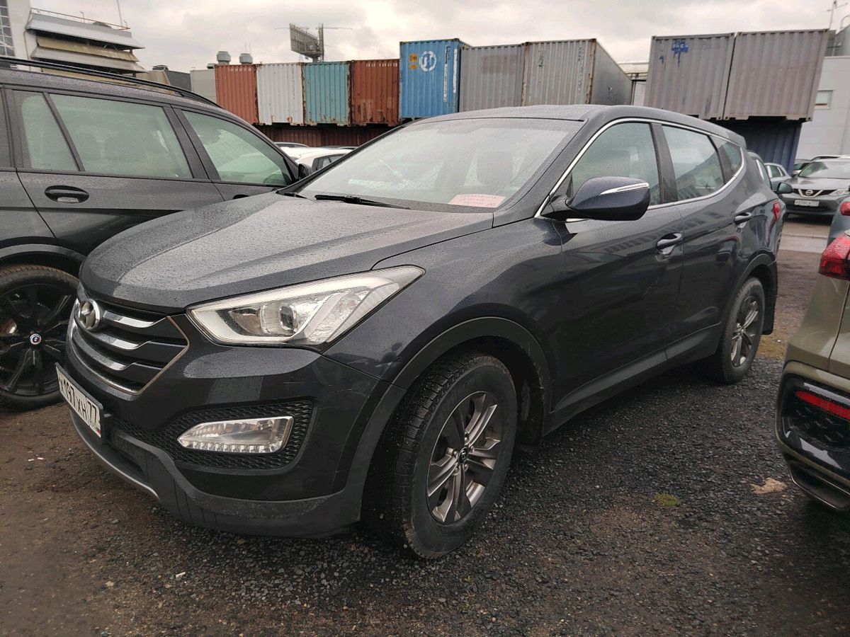 Автомобиль Hyundai Santa Fe III поколение (DM) 2.4 AT 4WD (175 л.с.) Comfort Чёрный 2013 с пробегом 125 341 км