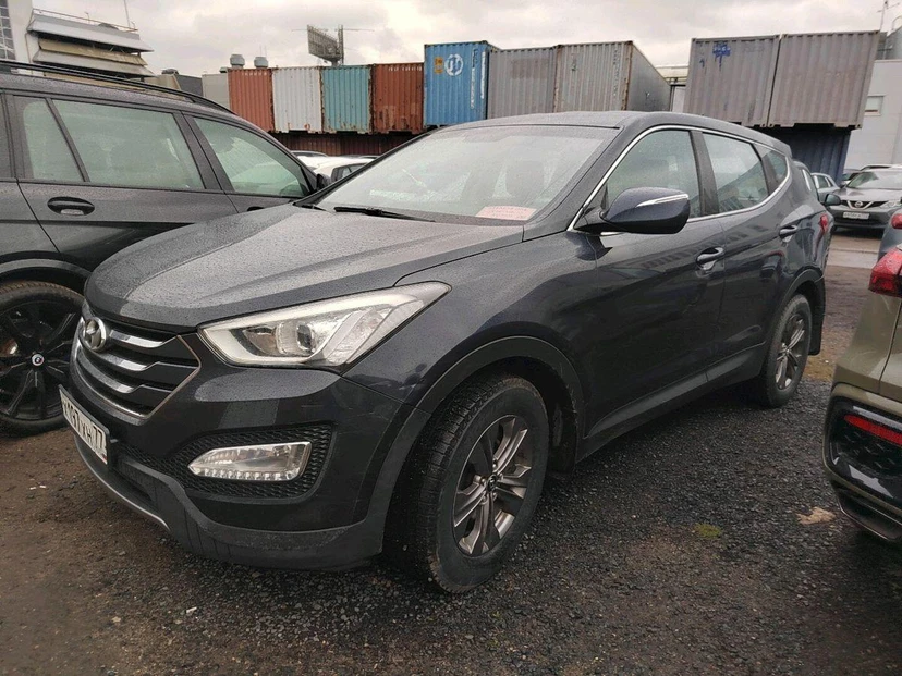 Автомобиль Hyundai Santa Fe III поколение (DM) 2.4 AT 4WD (175 л.с.) Comfort Чёрный 2013 с пробегом 125 341 км