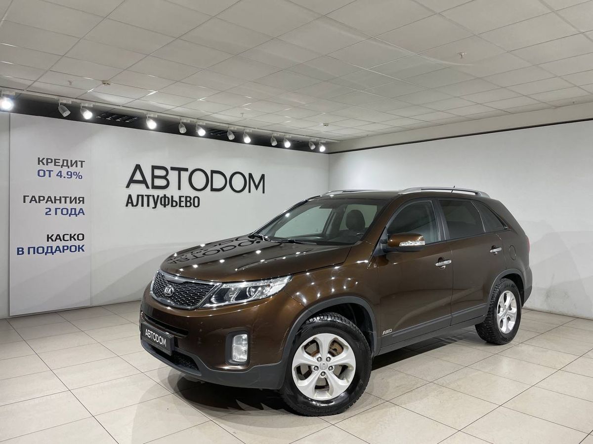 Автомобиль Kia Sorento II [рестайлинг] 2.4 MT 4WD (175 л.с.) Classic Коричневый 2014 с пробегом 227 022 км