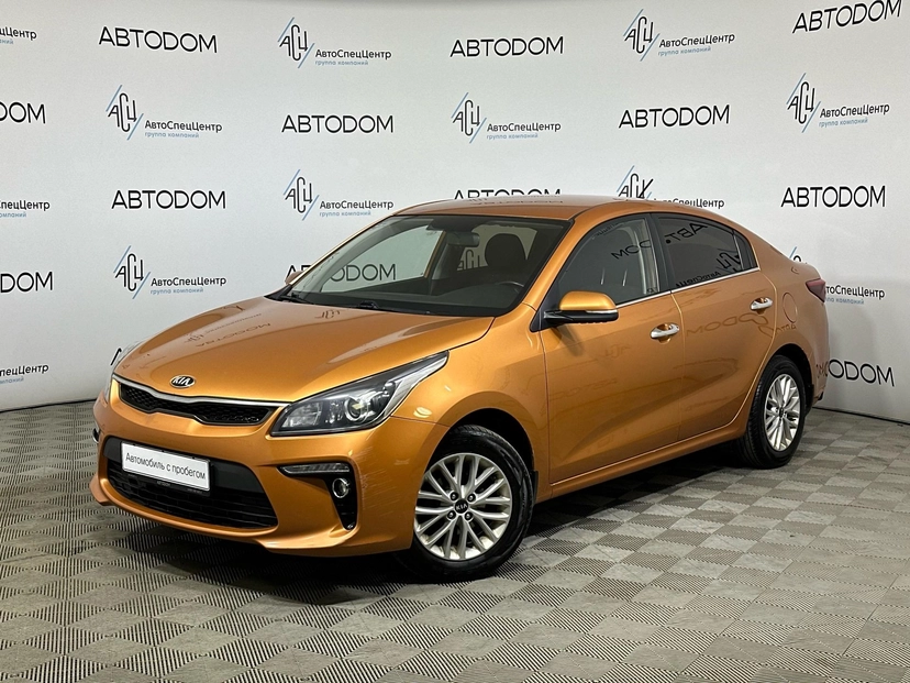 Автомобиль Kia Rio IV поколение 1.6 AT (123 л.с.) Prestige Оранжевый 2017 с пробегом 82 667 км