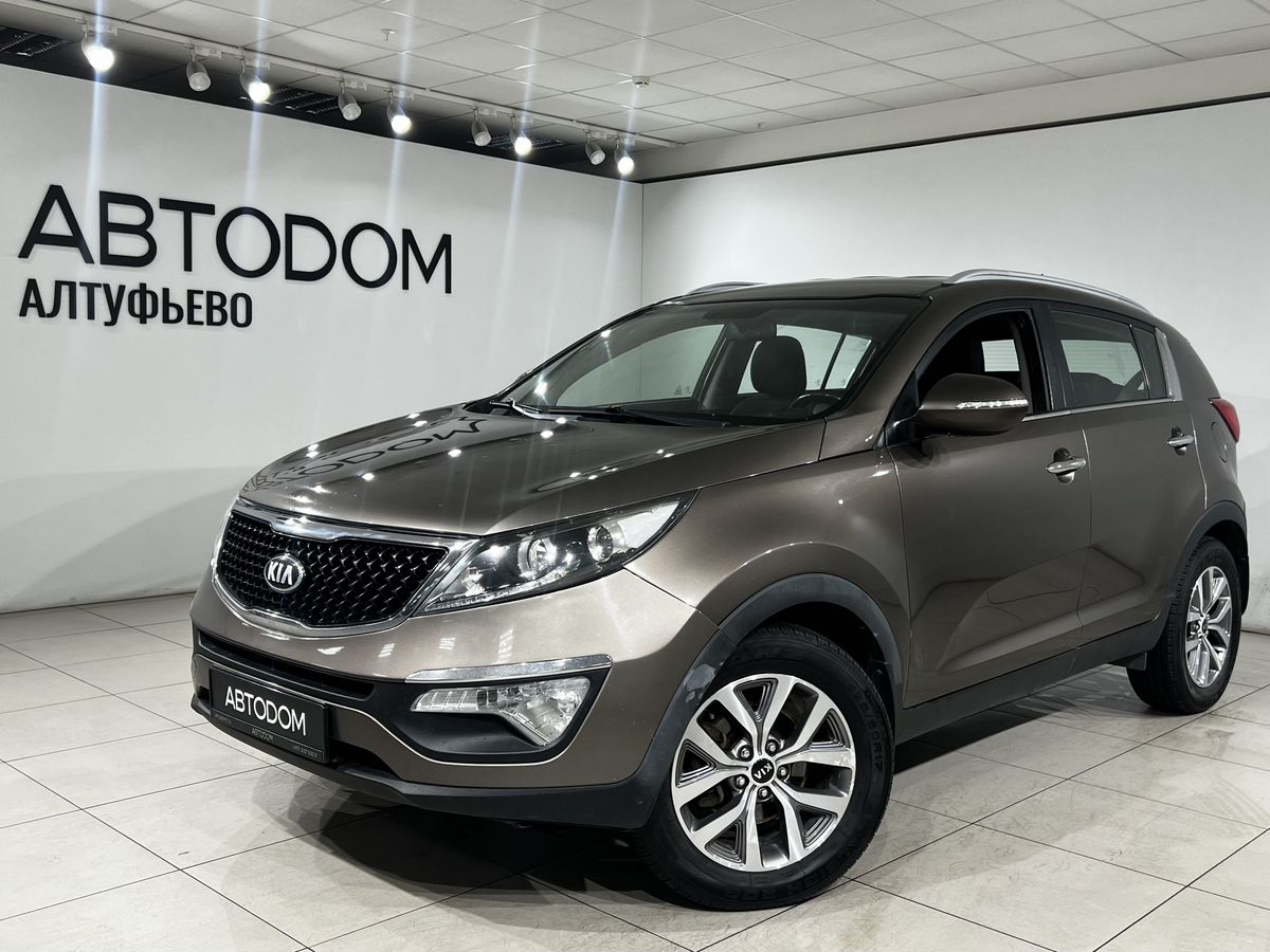 Kia Sportage III [рестайлинг] 2.0 AT (150 л.с.) Comfort Коричневый 2014 с пробегом 130 234 км