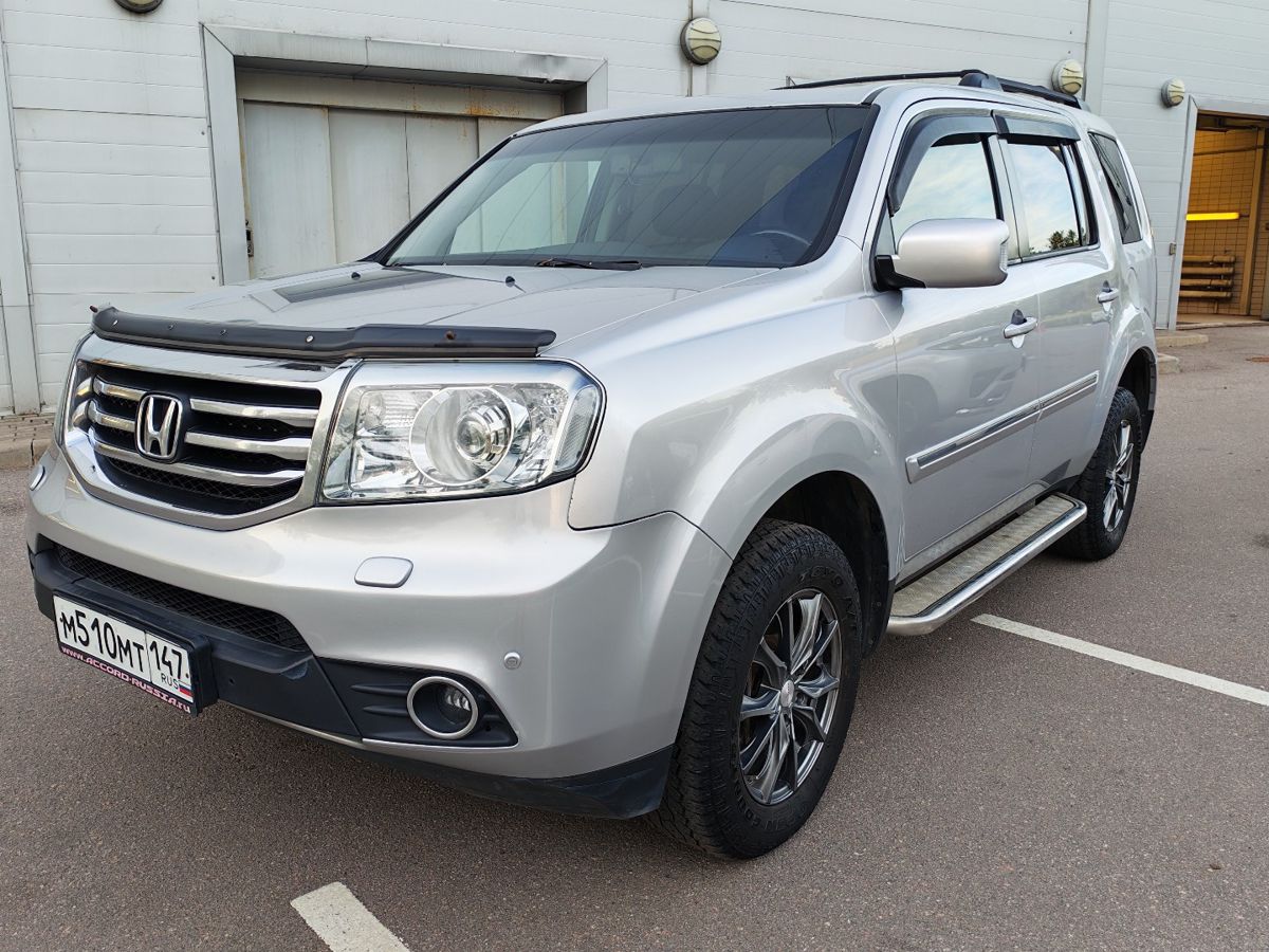 Honda Pilot II [рестайлинг] 3.5 AT 4WD (249 л.с.) Executive Серебристый 2012 с пробегом 379 292 км