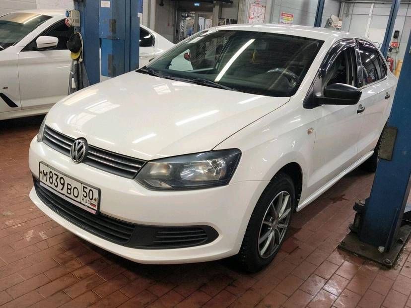 Автомобиль Volkswagen Polo V поколение 1.6 MT (105 л.с.) Trendline Белый 2013 с пробегом 201 400 км