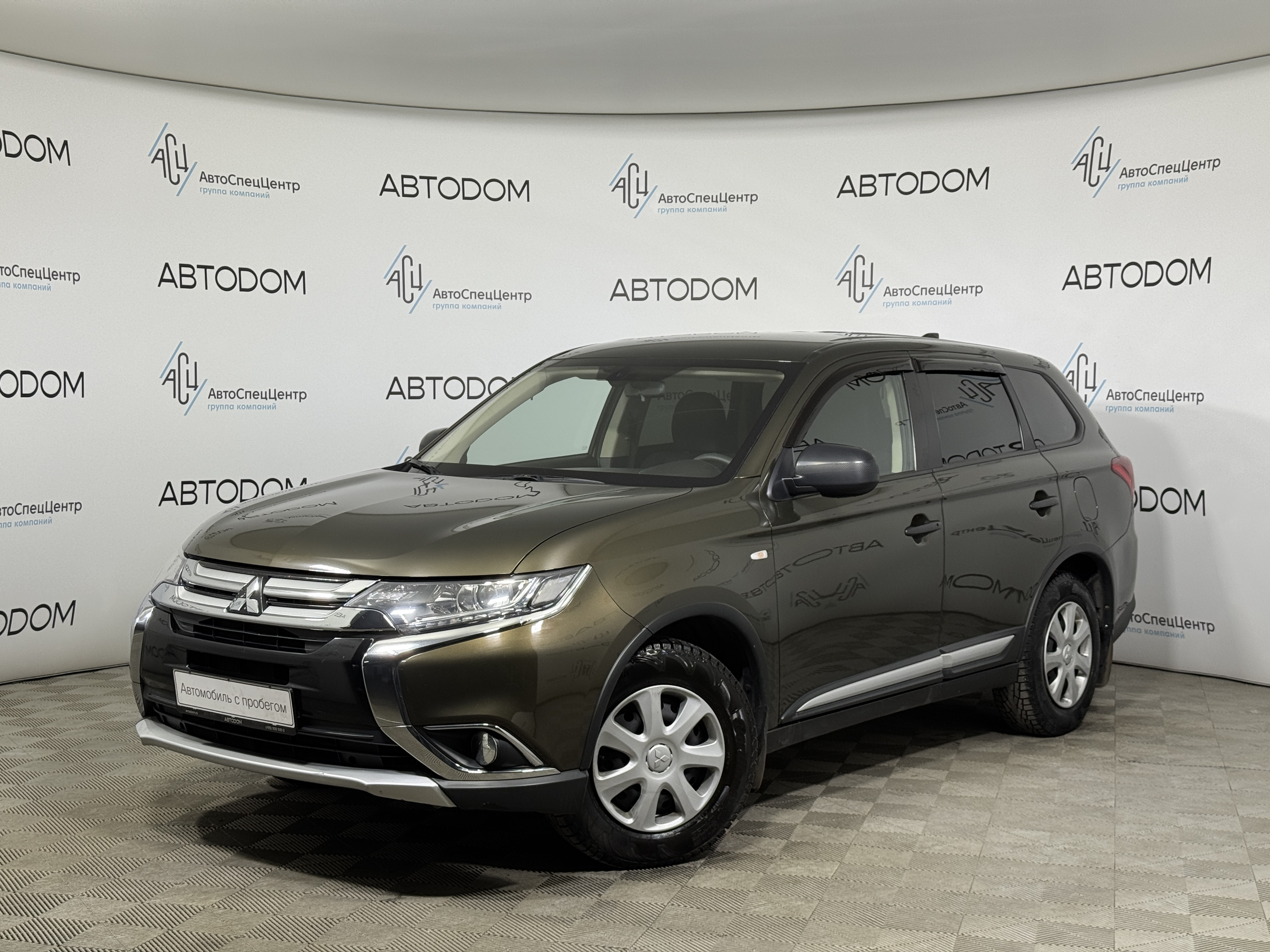 Автомобиль Mitsubishi Outlander III [2-й рестайлинг] 2.0 CVT (146 л.с.) Inform Коричневый 2018 с пробегом 162 481 км