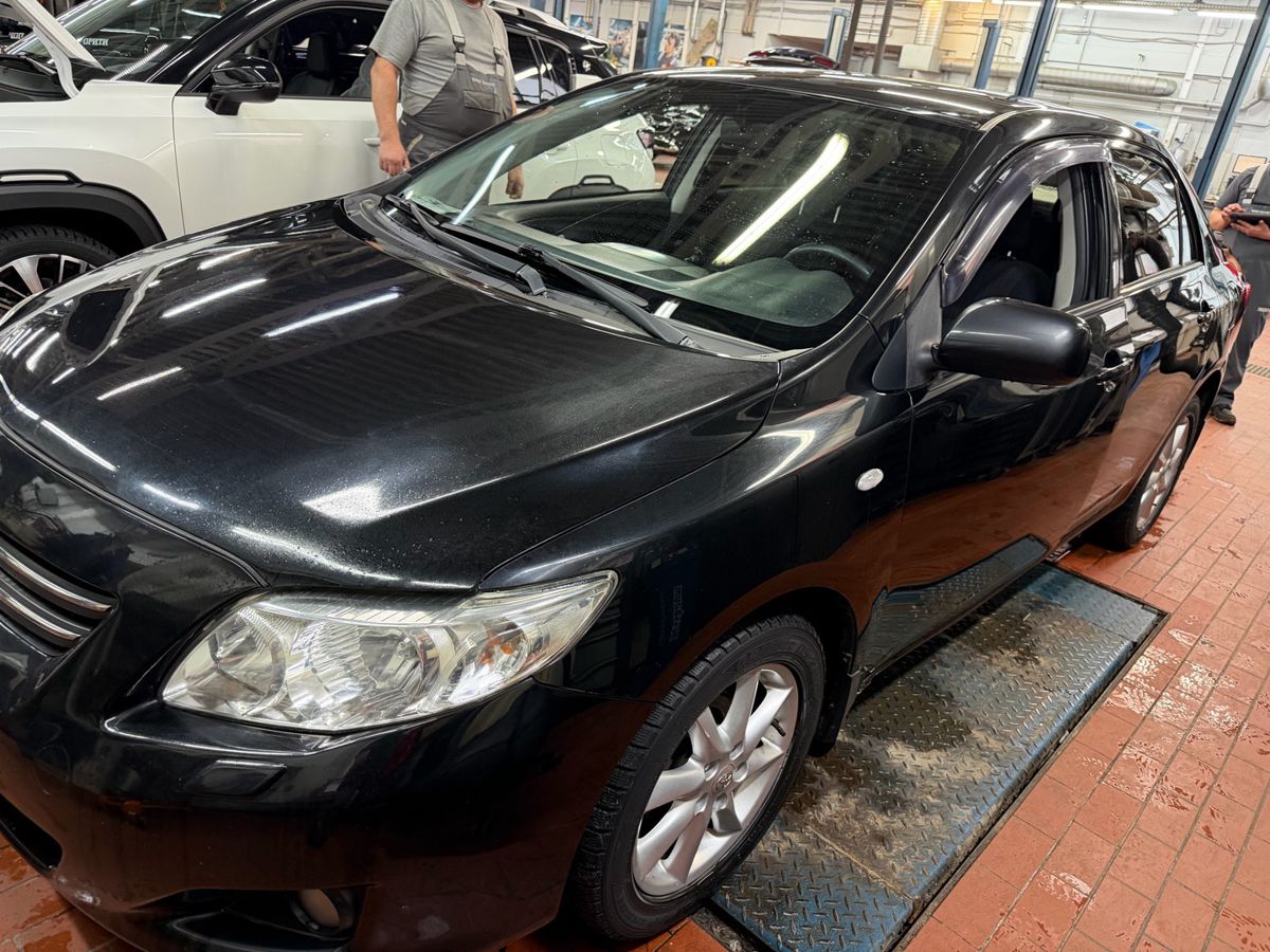 Автомобиль Toyota Corolla X поколение (E140/E150) 1.6 AMT (124 л.с.) Элеганс Чёрный 2008 с пробегом 228 114 км